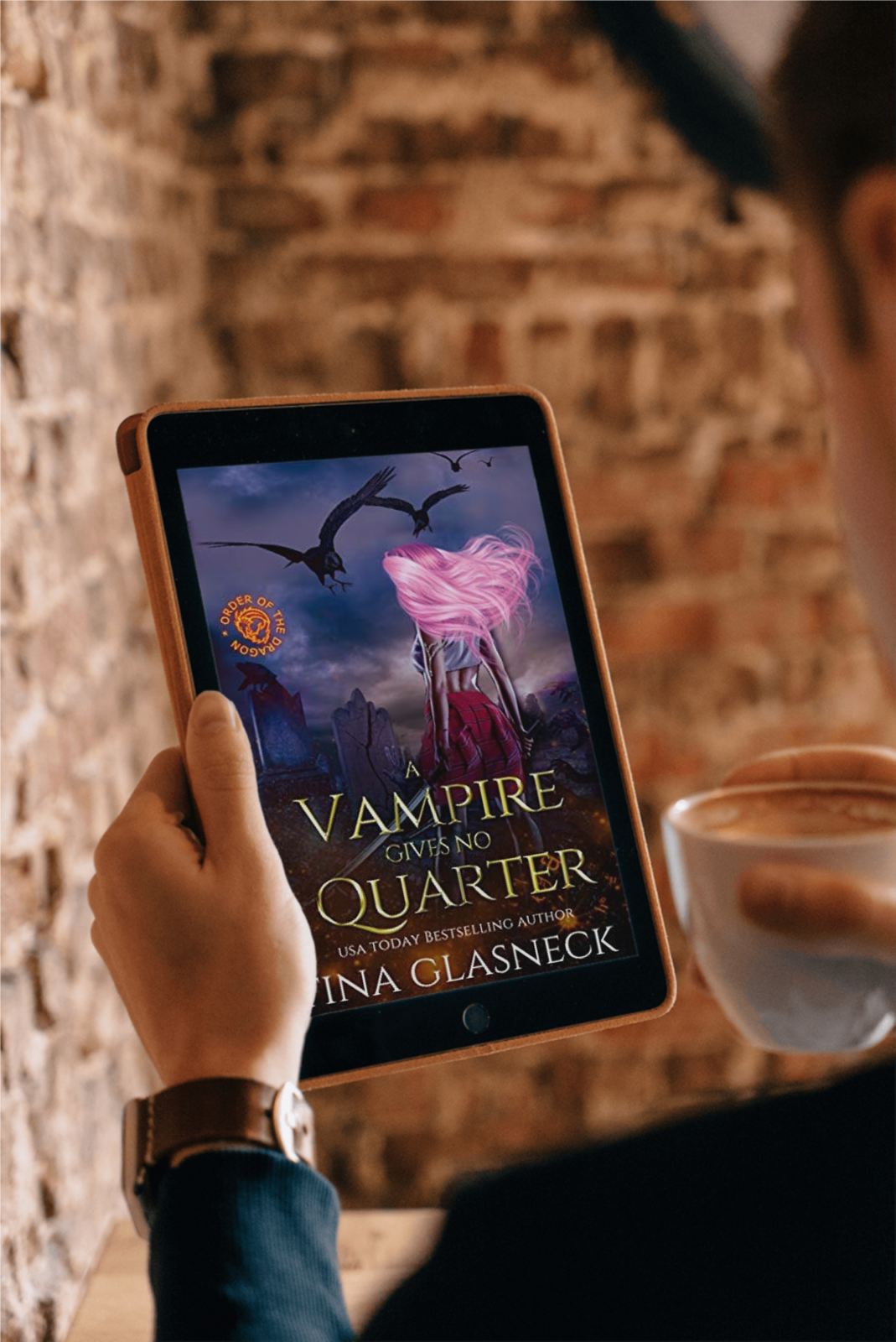A person holds a tablet displaying the book cover of 'Vampire Give No Quarter' by Ina Glasneck, with a blurred brick wall background and a cup of coffee nearby.